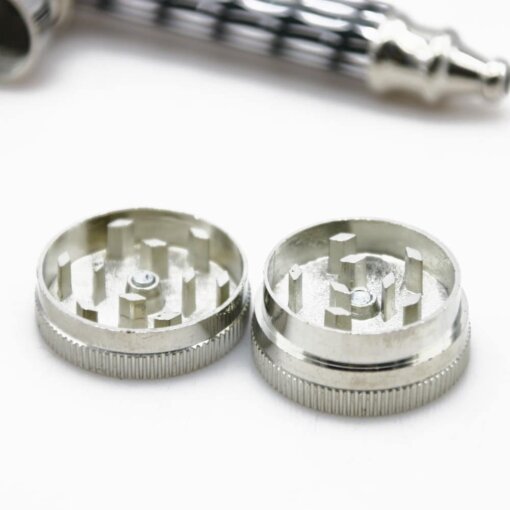 Two Smoking Pipes and Mini 2 Layer Metal Alloy Herb Grinders displayed on a white surface.