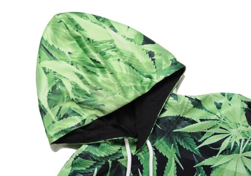 A marijuana-themed 3D hooded pullover adorned with green leaves.